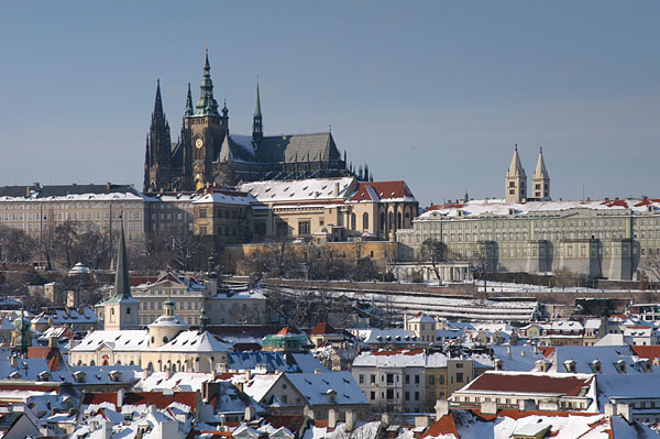 Lesser Town (Mala Strana) covered by snow with Prague Castle and St. Vitus Cathedral above